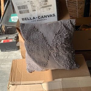 Grey throw pillow
